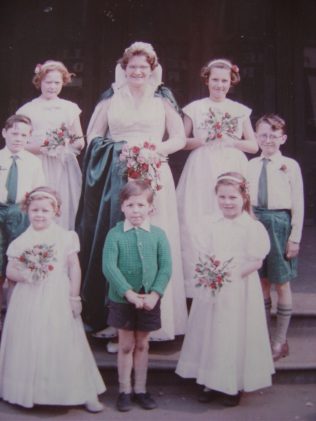 Not sure of the year, about 1958 ish? Band of Hope Queen, attendant to her right is Jacqueline (Jackie) Parker, boy in front of her is David Johnson (his parents ran a newspaper shop on Worksop Road). To the Queen's right is a girl I cannot remember and in front of and to her left is my brother, Kenneth Sidaway.